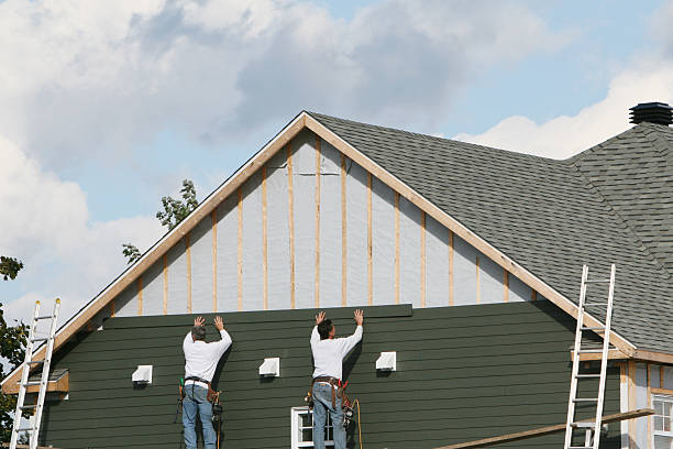 Professional Siding technician working in Negley, OH